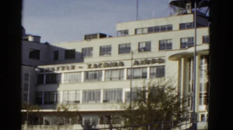 1952: seattle - tacoma white airport building with visitors entering SAN Stock Footage