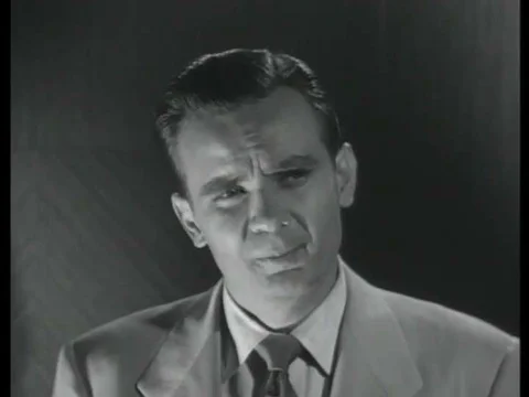 1952, Two men trapped in an elevator during a practice air raid argue opposing Stock Footage 83215225