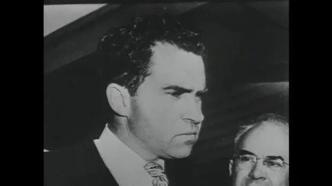 1952 Two men trapped in an elevator during a practice air raid argue opposing Stock Footage 115668594