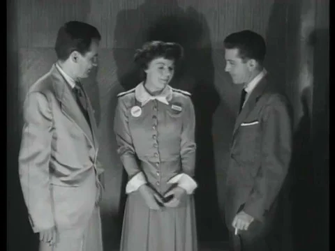 1952,Two men trapped in an elevator during a practice air raid argue opposing Stock Footage 83215216