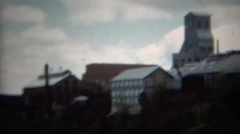 1953: Hilltop Mining Processing Factory Complex with Warehouse Buildings. Stock Footage 58953206