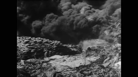 1953 - A massive fire breaks out at a rubber tire factory in France. Stock Footage 162731434