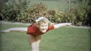 1953: Small Girl Practicing Curtain Call Bowing And Blowing Kisses. Stock Footage