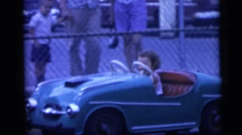 1954: a child is seen in a small car PENNINGTON, NEW JERSEY Stock Footage