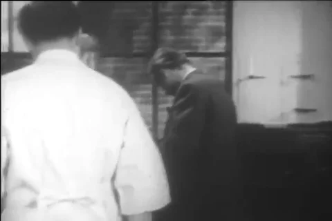 1954 - Dr. Alexander Fleming and his assistants conduct multiple experiments Video stock 99672401