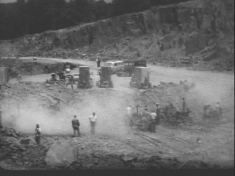 1954 - Dynamite is planted and blasting is shown in a quarry in Utah. Stock Footage 82971246