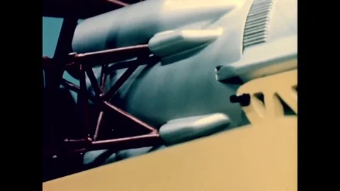 1954 - A scale model shows elevators in a work stand erecting an XB-65 launch 動画素材 79524925