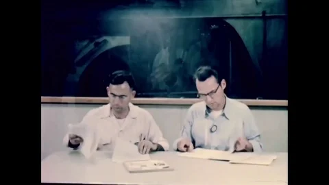 1954 - A thermodynamicist and a chemist work on insulating materials and a solar Stock Footage 83104699