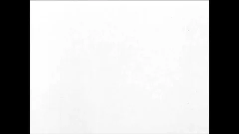 1955 - An atomic bomb blast explodes into a mushroom cloud in the desert as 動画素材 85947946