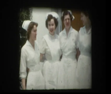 1955 group of nurses pose for photo Stock Footage 33864170