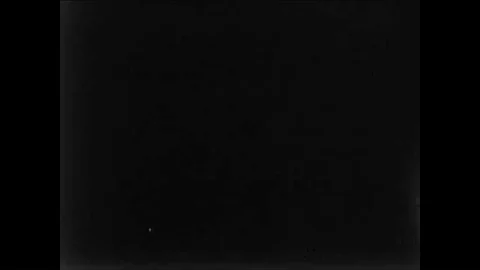 1955 - A nuclear device is detonated and it explodes into a mushroom cloud as 動画素材 85947798