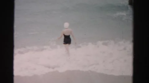 1955: old guy getting out of the water MIAMI, FLORIDA Stock Footage