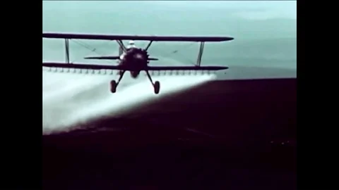 1955 - Various crop-dusters are seen at work while a narrator discusses some Stock Footage 85953068
