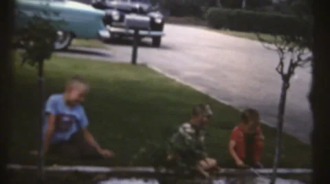 1955  vintage boys playing, in mud | Stock Video