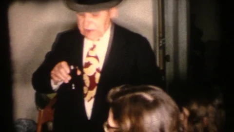 1955 VINTAGE HOME MOVIE, Jewish family eating Stock Footage