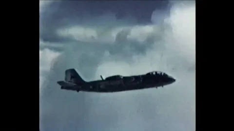 1956 - The Cherokee shot explodes into a nuclear mushroom cloud and an aircraft 動画素材 86136016