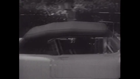 1956 - In this classic exploitation movie, a police car chase takes place near a Stock Footage