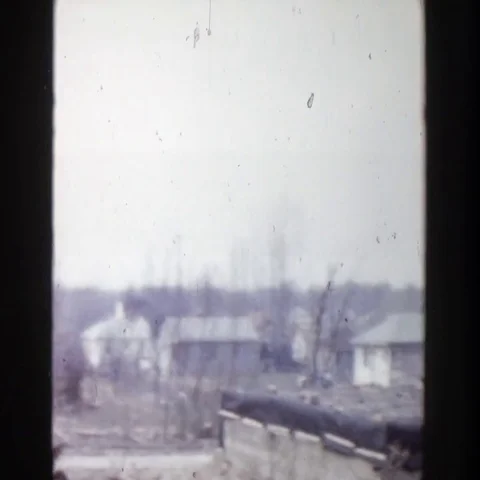 1956: Dumping Yard with Thrown Out Objects Heaped Near Buildings GRAND Video stock 69450712
