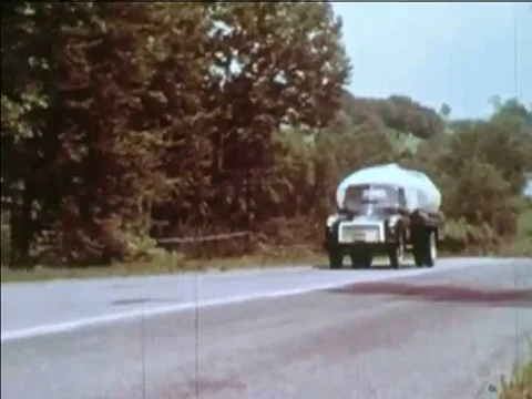 1956’Milk is hauled by an insulated tank truck to a processing center, and Stock Footage