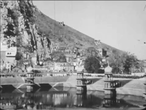 1957 _ Indians soldiers march, and the Maharaja of Alwar parades down a street Stock Footage