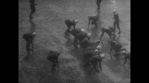 1957-American Football Game / Mud / USA / 1957 Stock Footage