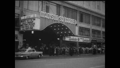 1957 - Thousands attend a sermon by Billy Graham at Madison Square Garden. Stock Footage 172585564
