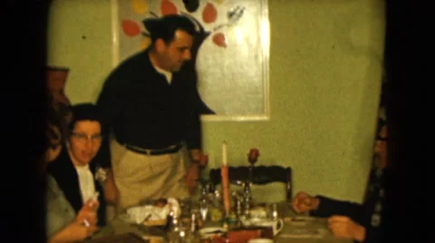 1957: Two Men Eating Dinner with Women Off-Screen in Las Vegas Stock Footage 67882174