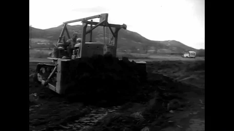 1957 - The US Army Corps of Engineers builds a bridge to replace one wiped out Video stock 95642482