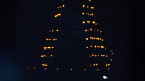 1957:WHEELING OHIO.Yellow Lights In A Triangular Shape Spinning To The Right 스톡 사진