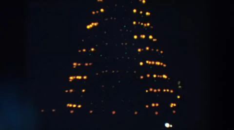 1957:WHEELING OHIO.Yellow Lights In A Triangular Shape Spinning To The Right 스톡 사진