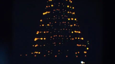 1957:WHEELING OHIO.Yellow Lights In A Triangular Shape Spinning To The Right 스톡 사진