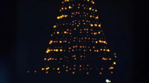 1957:WHEELING OHIO.Yellow Lights In A Triangular Shape Spinning To The Right 스톡 사진