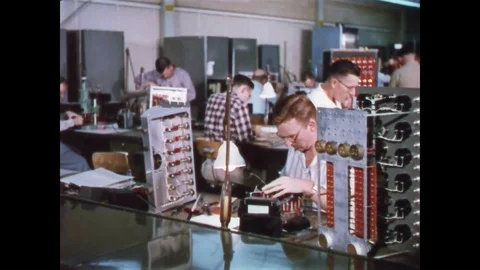 1958 - The electronics shop of a nuclear plant is shown. Stock Footage 86407618