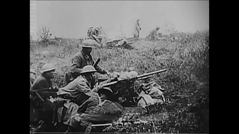 1958 - Ground troops fire machine guns and artillery pieces in World War 1 and Stock Footage 85947642