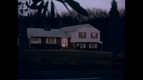 1958 - A hostess demonstrates Tupperware home products to guests at a party in a Stock Footage 79444992