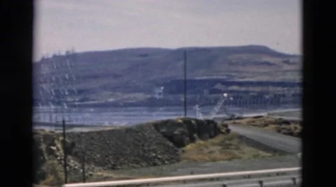 1958: many roads and bridges lead to and from hydroelectric dam. OREGON Stock Footage