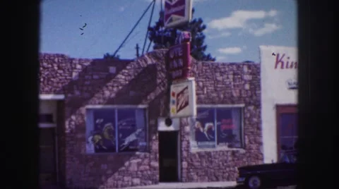1958: a market area beside a road area is seen COLORADO Stock Footage
