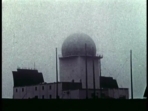 1958- Men install radar and communications equipment and are supervised by Stock Footage 79454476