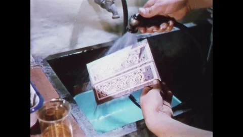 1958 - Men make plastic and elastic compounds at a nuclear weapons facility. Stock Footage 86407625
