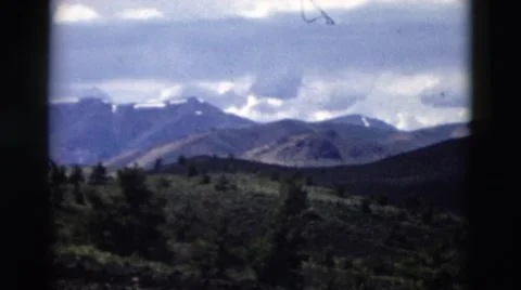1958: panning panoramic of mountain range MONTANA Stock Footage