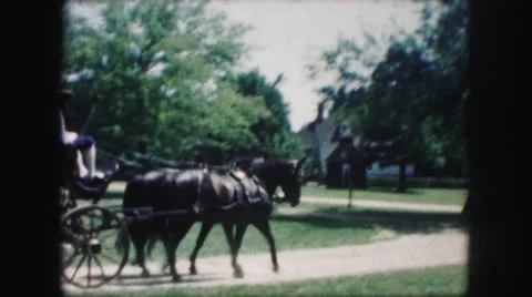 1958: people are travelling on a horse cart and entering the church AMES, IOWA Stock Footage