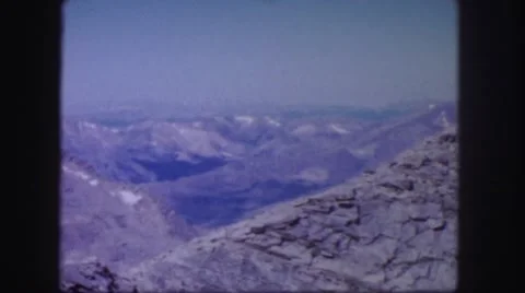 1958: a rugged mountain top with crevices filled with snow COLORADO Stock Footage