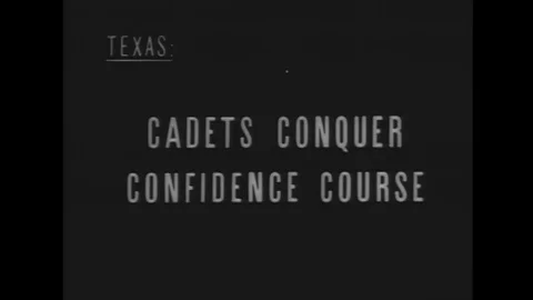1958 - Trainees go through a confidence-building obstacle course at Lackland Air Vídeos de archivo 123874803