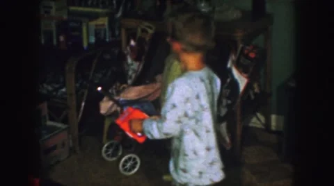 1958: two children with playing with toys AMES, IOWA Stock Footage