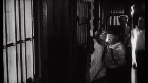 1959 - In this drama film, an angry white mob ties a noose around a black man Stock Footage