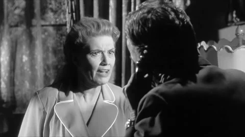 1959 - In this horror film, a devoted servant tries to find her captive boss Stock Footage 203733403
