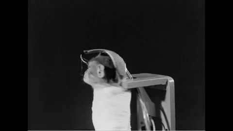 1959 - A monkey, tightly wrapped to a research device, is spun around for Stock Footage 126122001