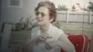1959 - Woman Heavy Smoker Lights Another Cigarette Stock Footage