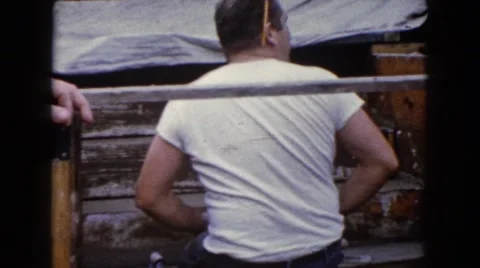 1960: a construction area beside a mud WAUCONDA, ILLINOIS Stock Footage