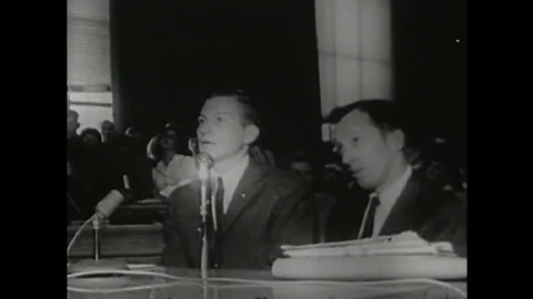 1960 - Douglas Wachter is called to testify at a HUAC hearing, and students Stock Footage 146452826